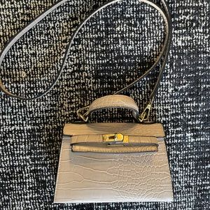 Faux snake mini crossbody bag